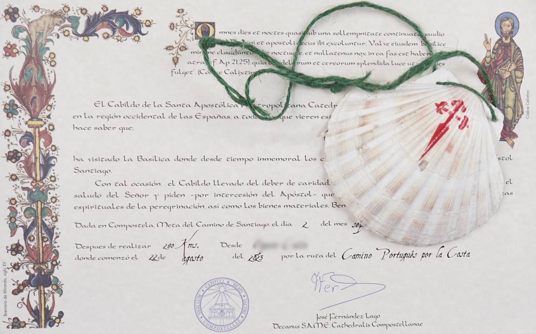 Certificate of Distance and pilgrim’s scallop shell
The scallop shell souvenir and the certificate issued by the Santiago cathedral, noting the number of kilometres a pilgrim has travelled. (Courtesy: Jillian Reid) 
